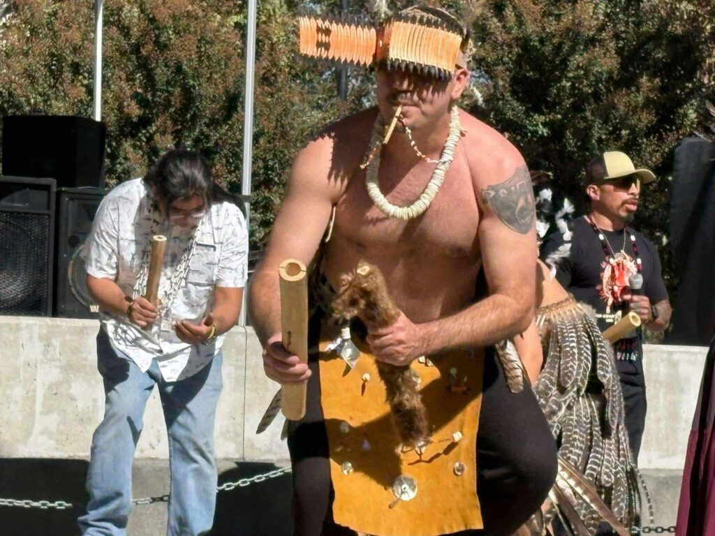 Miwok and Pomo man dancing to share his blessing with the community